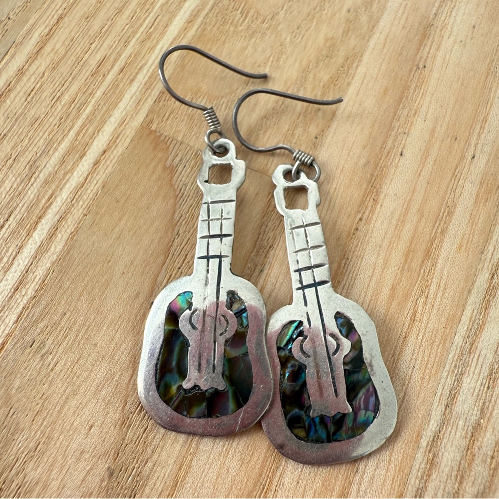 Silver and abalone guitar dangle earrings on hooks